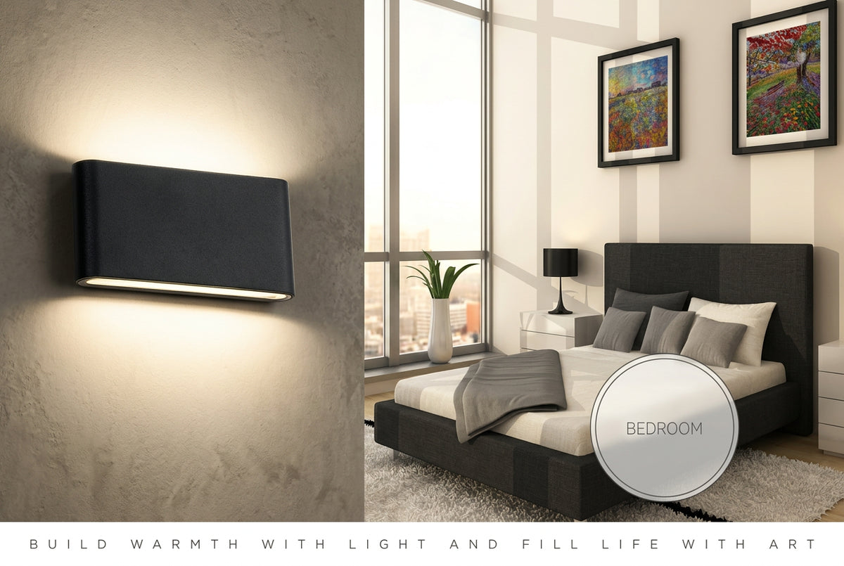 Modern bedroom with black bed, wall art, and a television.