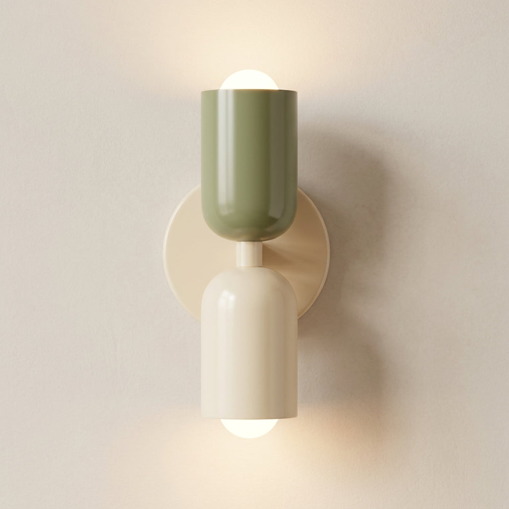 Wall-mounted lamp with green and beige design on a light gray background