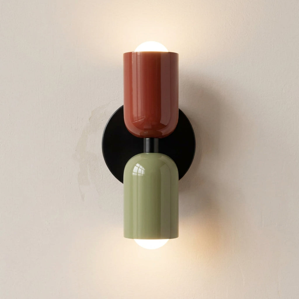 Wall-mounted lamp with red and green design on a white background